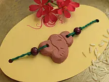 Terracotta ❂ Handmade . Rakhi { g }